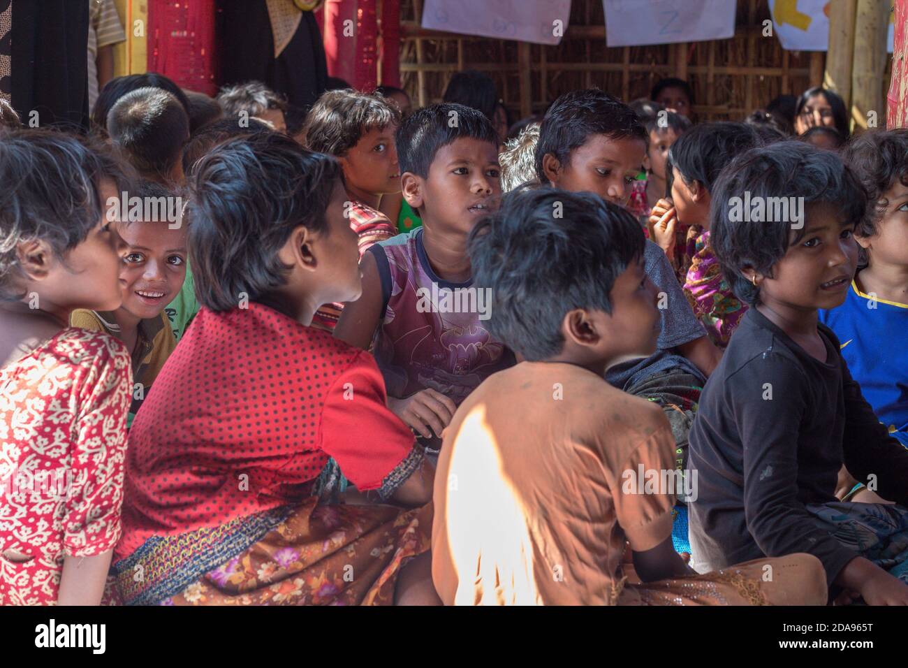 COX'S BAZAR, BANGLADESH - NOVEMBER 25, 2017: Rohingya Muslim refugee children at the camp learning center. Stock Photo