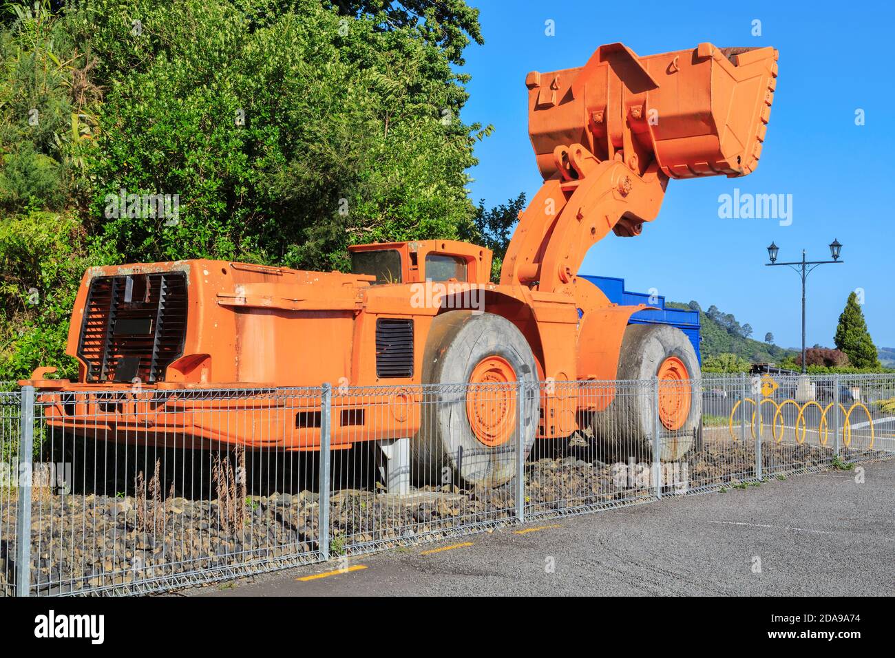 A giant front-end loader earth mover known as a 'bogger' on display in Waihi, New Zealand Stock Photo