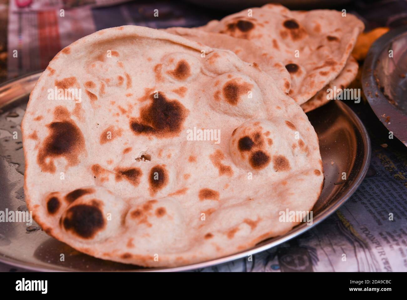 Indian flatbread tandoori roti and Malai kofta curry made in tandoor