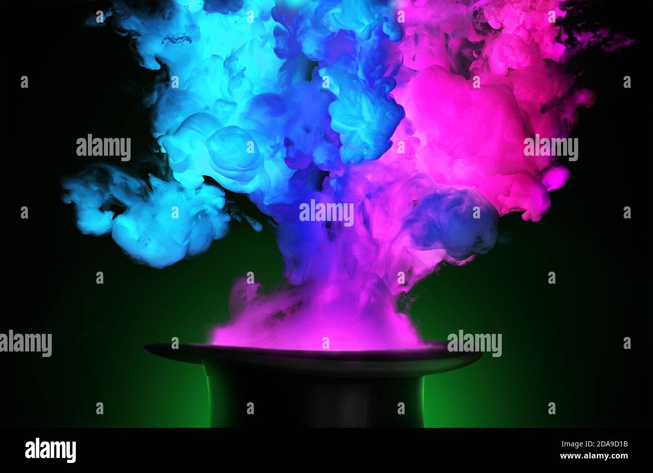 Colorful smoke coming out from a magician hat Stock Photo