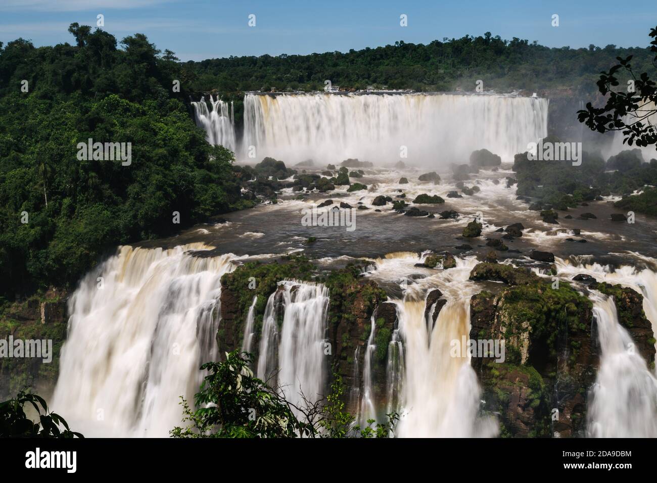 Foz do Iguaçu, Brazil. 16th February, 2017. View of "Salto Rivadavia" (top), "Salto Tres Mosqueteros" (bottom) and "Salto Dos Mosqueteros" waterfalls at Iguazu National Park in Argentina, viewed from the Brazilian side, Iguaçu National Park, Parana State, Brazil. Stock Photo