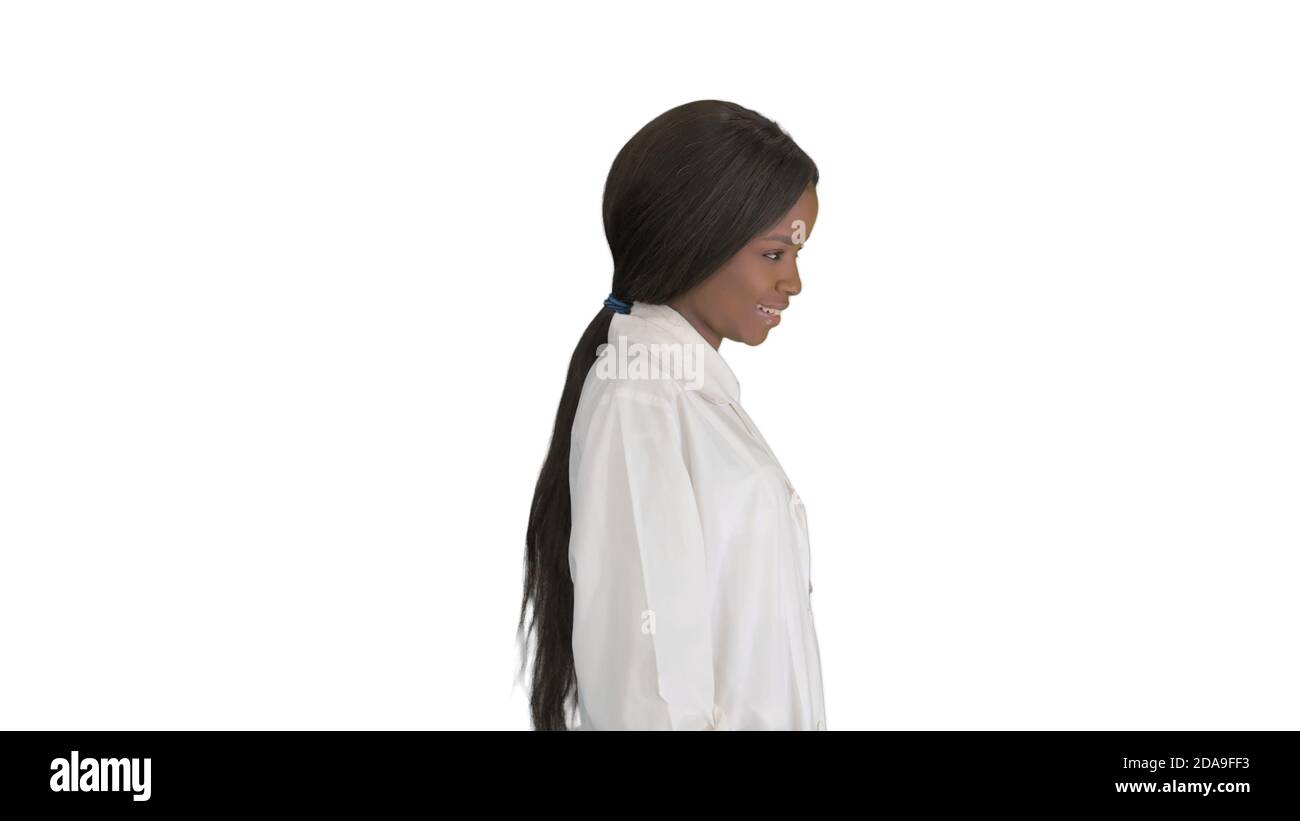 Pretty african american female doctor posing on white background Stock Photo
