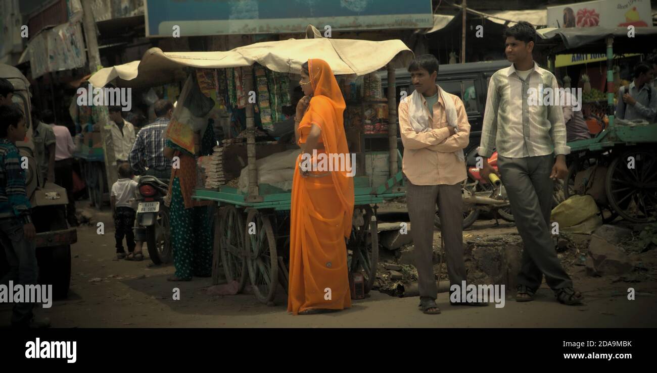 People standing at a roadside market in Rajasthan, India. Stock Photo