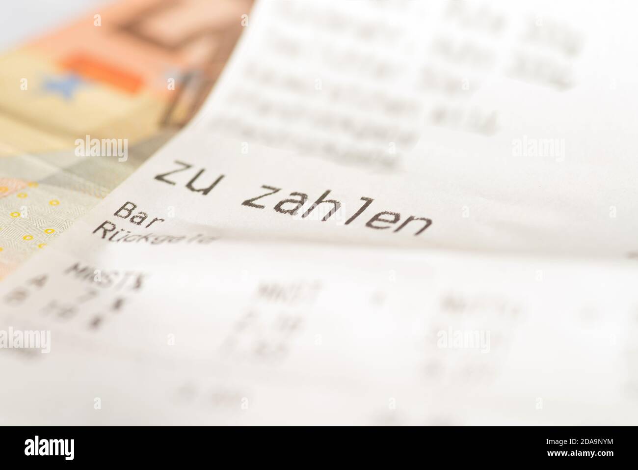 A receipt and euro bills Stock Photo
