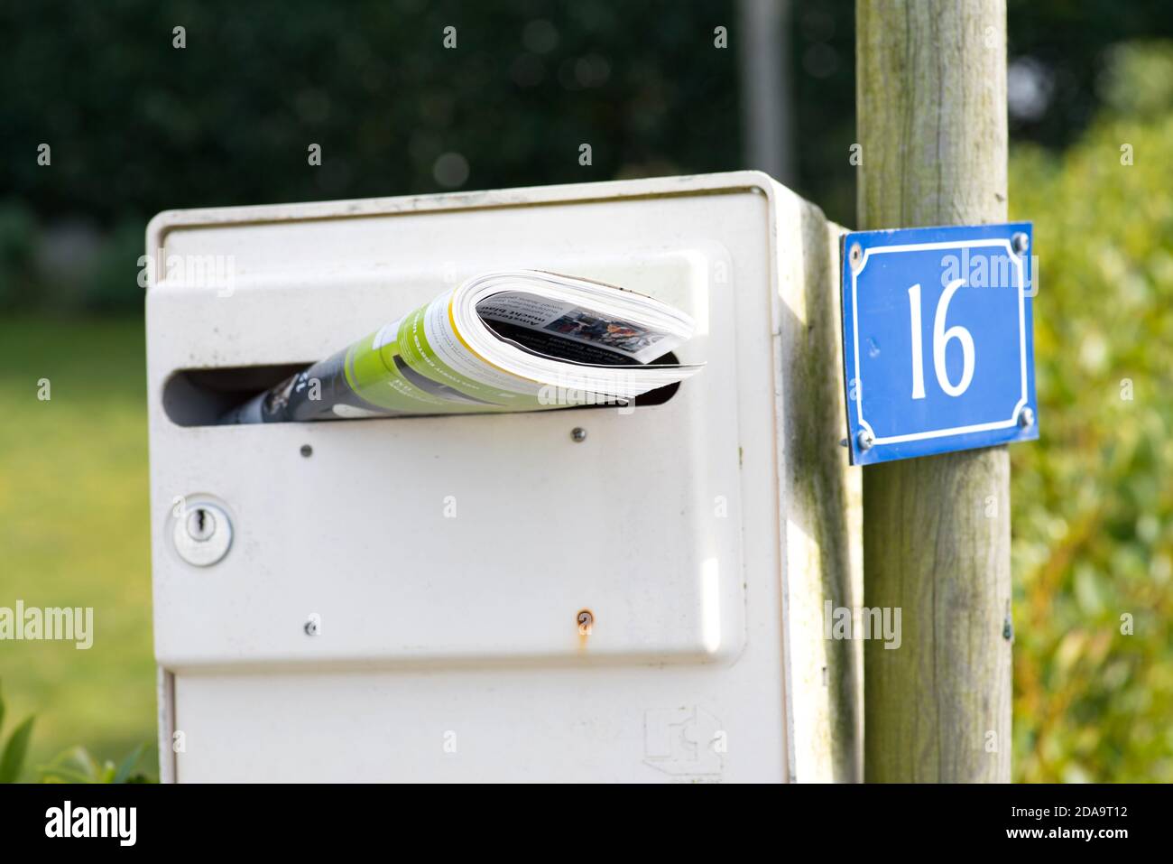 A newspaper in a mailbox Stock Photo Alamy