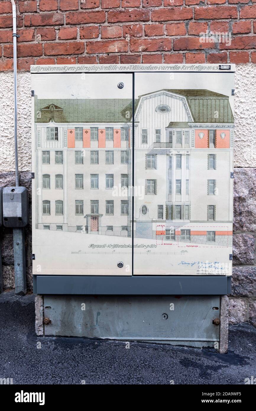 Architectural drawing by Oiva Kallio from 1910 on street cabinet in front of the actual building in Kruununhaka district of Helsinki, Finland Stock Photo