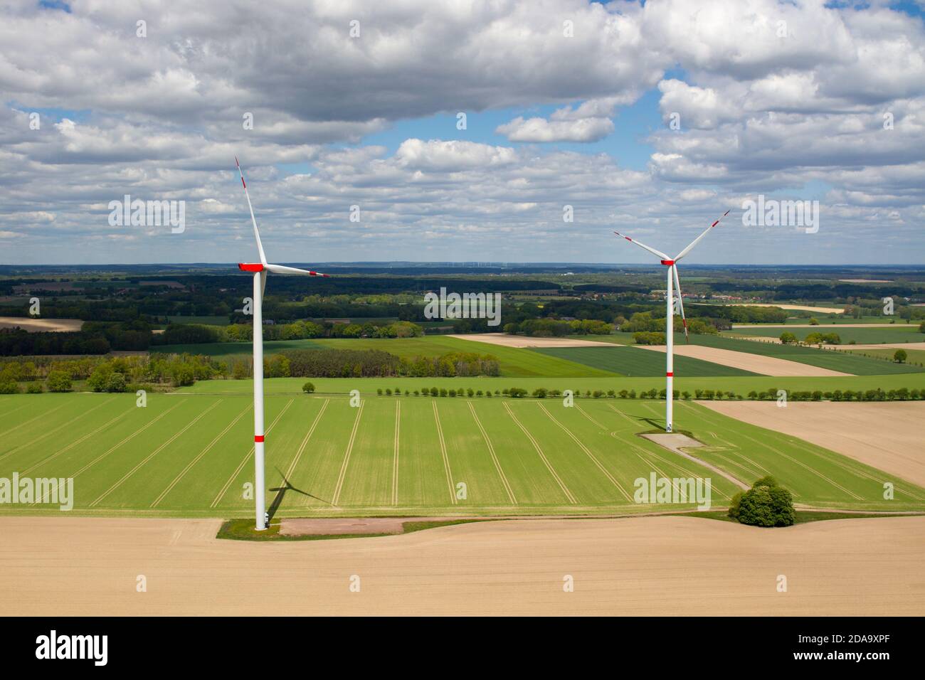 wind turbine, wind farm on a sunny cloudy day shot from eye level, hub