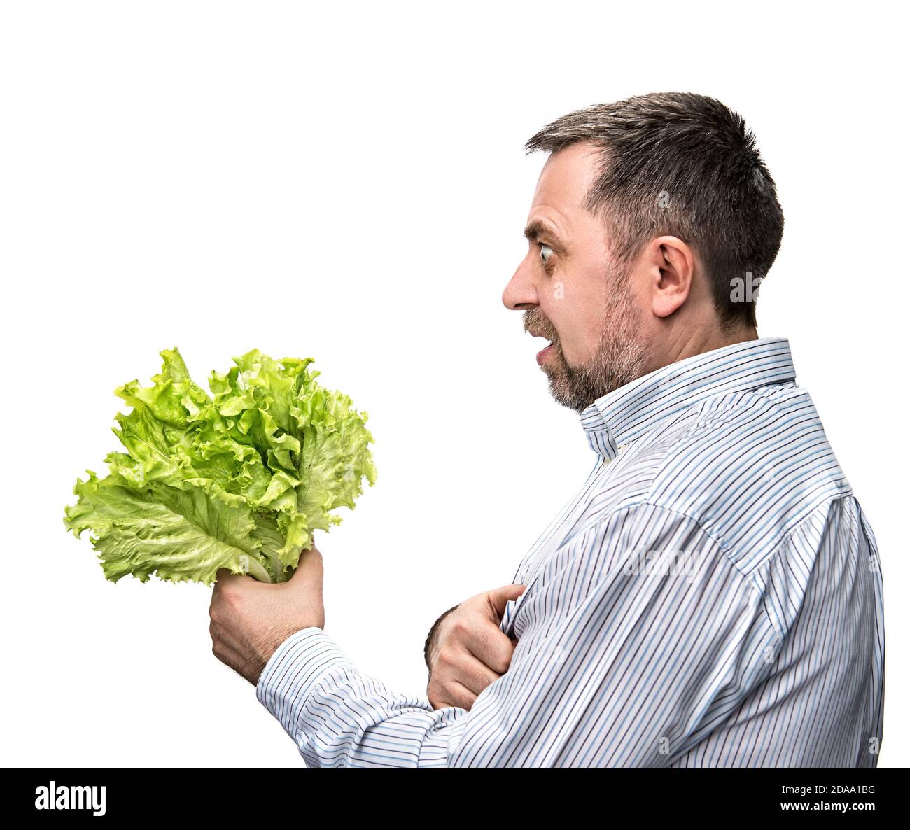 Healthy food. Man holding lettuce isolated on white Stock Photo