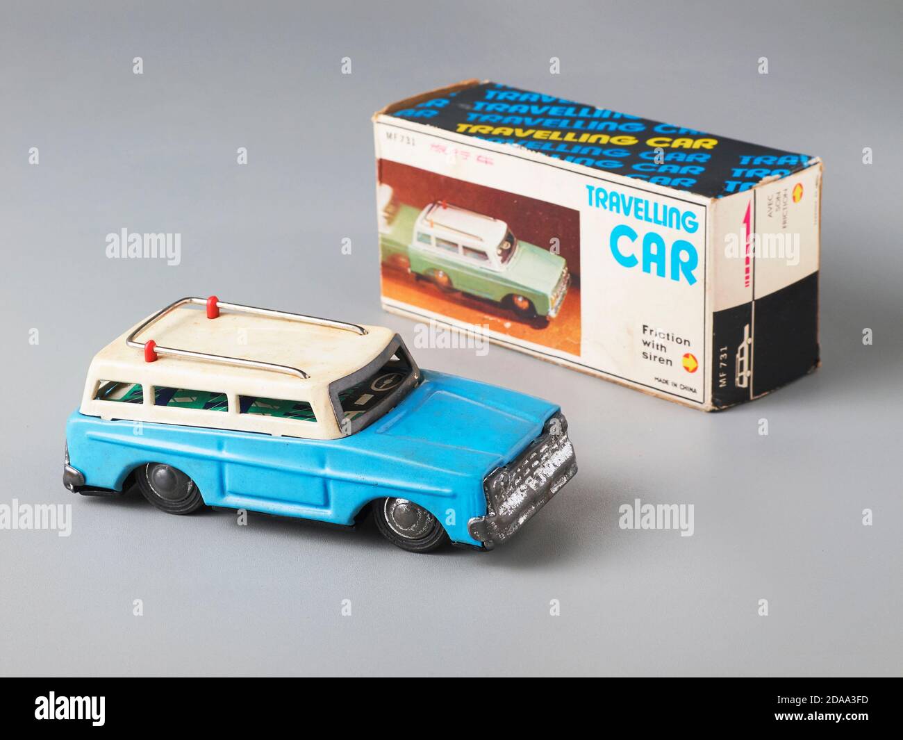 A classic tin toy van with an vintage box on the back Stock Photo Alamy
