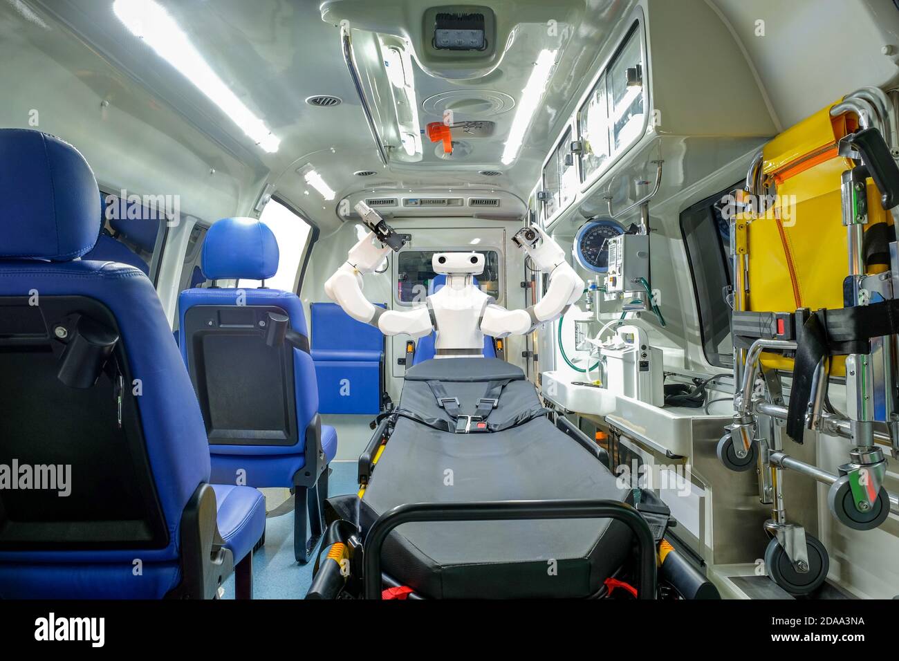 Inside smart ambulance car with medical equipment and smart robot assistant for helping patients before bring to hospital, smart medical 4.0 concept Stock Photo