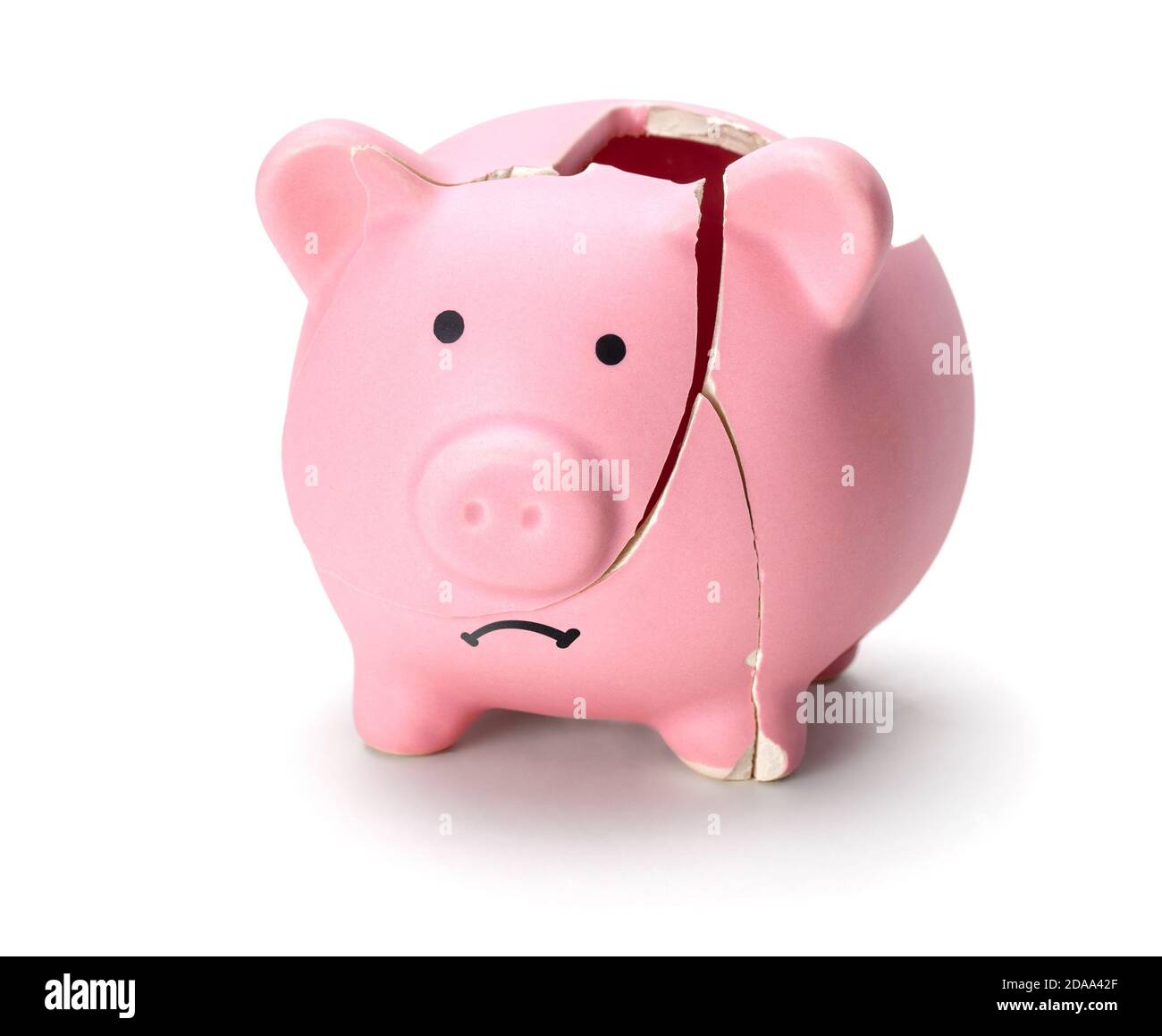 Broken piggy bank isolated on white background Stock Photo - Alamy