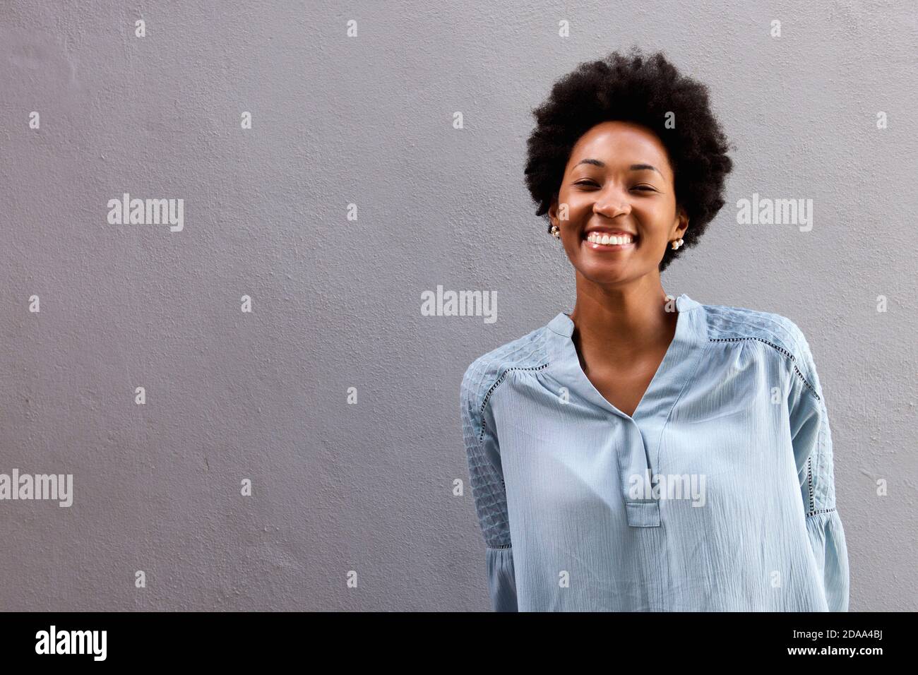 Portrait of beautiful young african american woman with lovely smile on ...