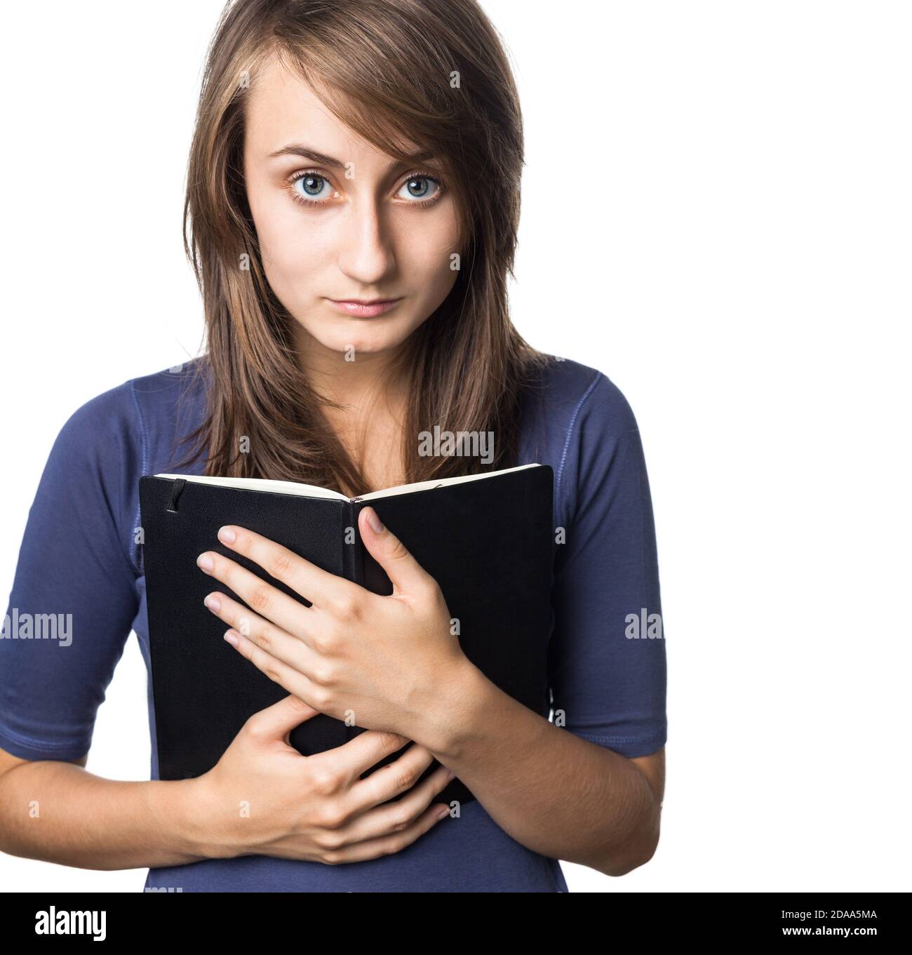 Education concept. Female student hold a notebook isolated on a white ...