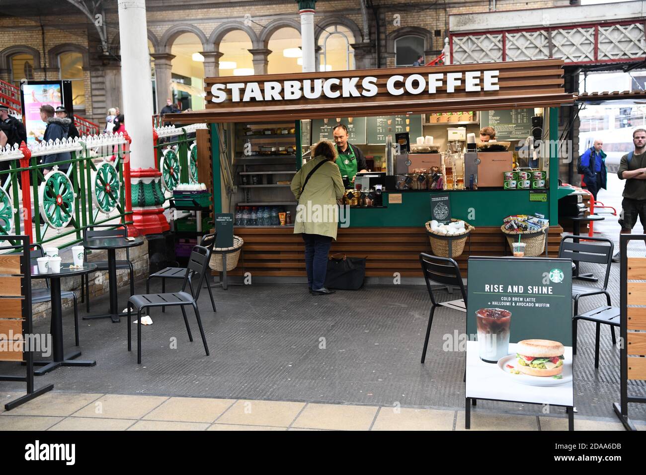 Starbucks Coffee kiosk on the station concourse at Preston Railway Station, England, UK Stock Photo