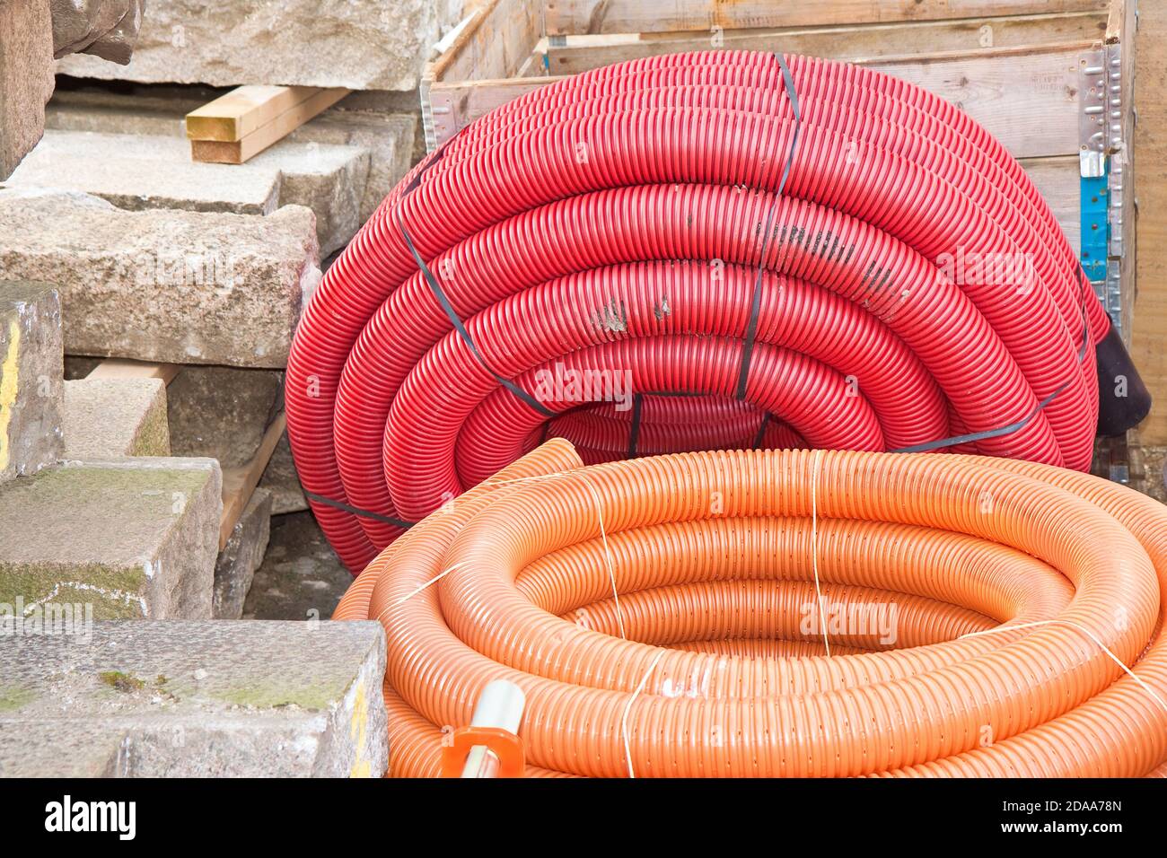 Red plastic flexible tube construction hires stock photography and images Alamy