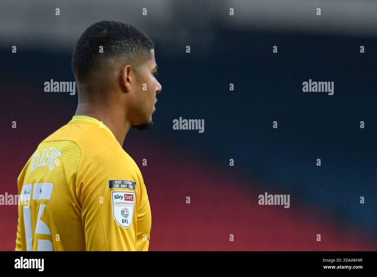 Seny Dieng #13 of Queens Park Rangers displays the Sky Bet Championship badge and the anti racism badge on his shirt with the words not today or any day Stock Photo