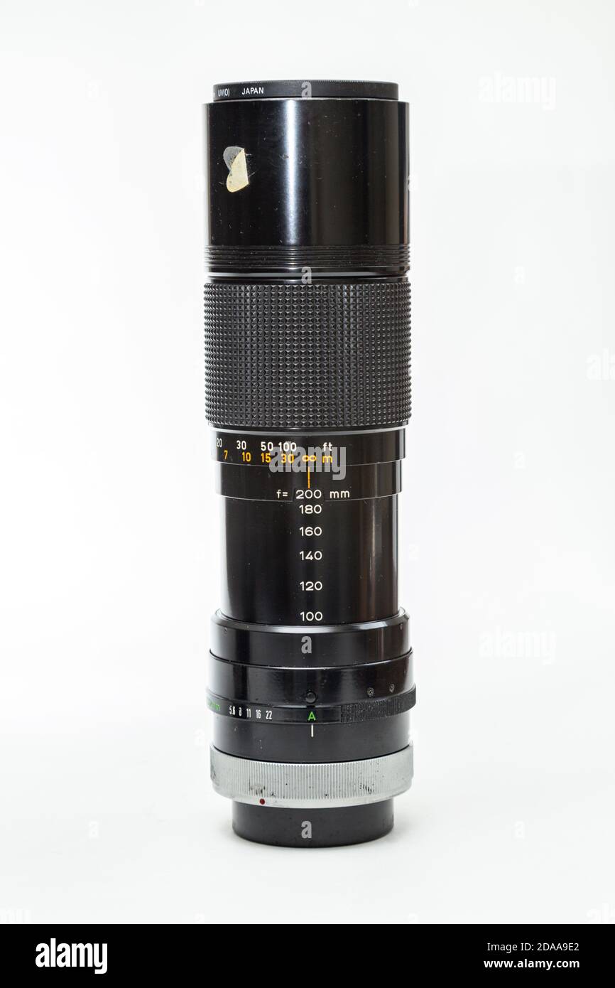 1970s CANON 100 - 200mm  f5.6 FD zoom lens, old and dusty condition. Stock Photo
