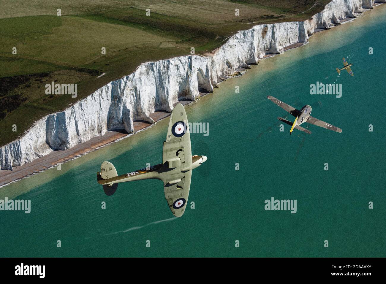 An RAF Supermarine Spitfire banks to attack a Luftwaffe Focke-Wulf FW190 fighter over the Cliffs of Dover. A mixture of plastic models and Photoshop. Stock Photo