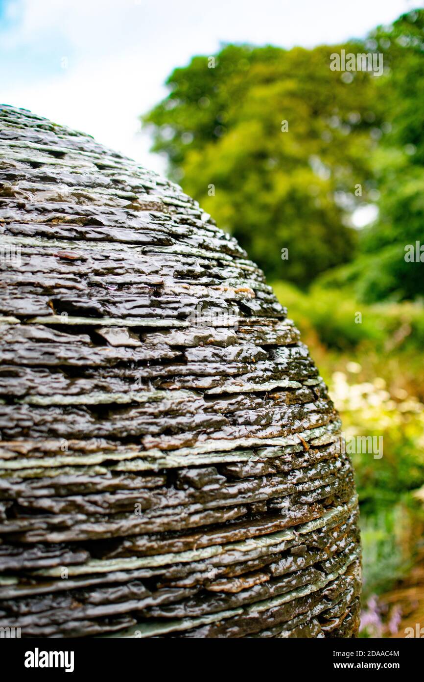 An artistic view of the Stone Sphere Water feature in Cawdor Castle Garden Stock Photo