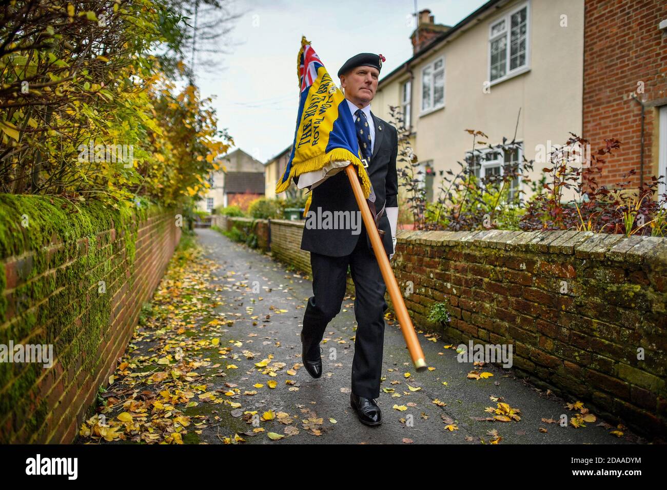 Royal British Legion standard bearer Richard makes his way to