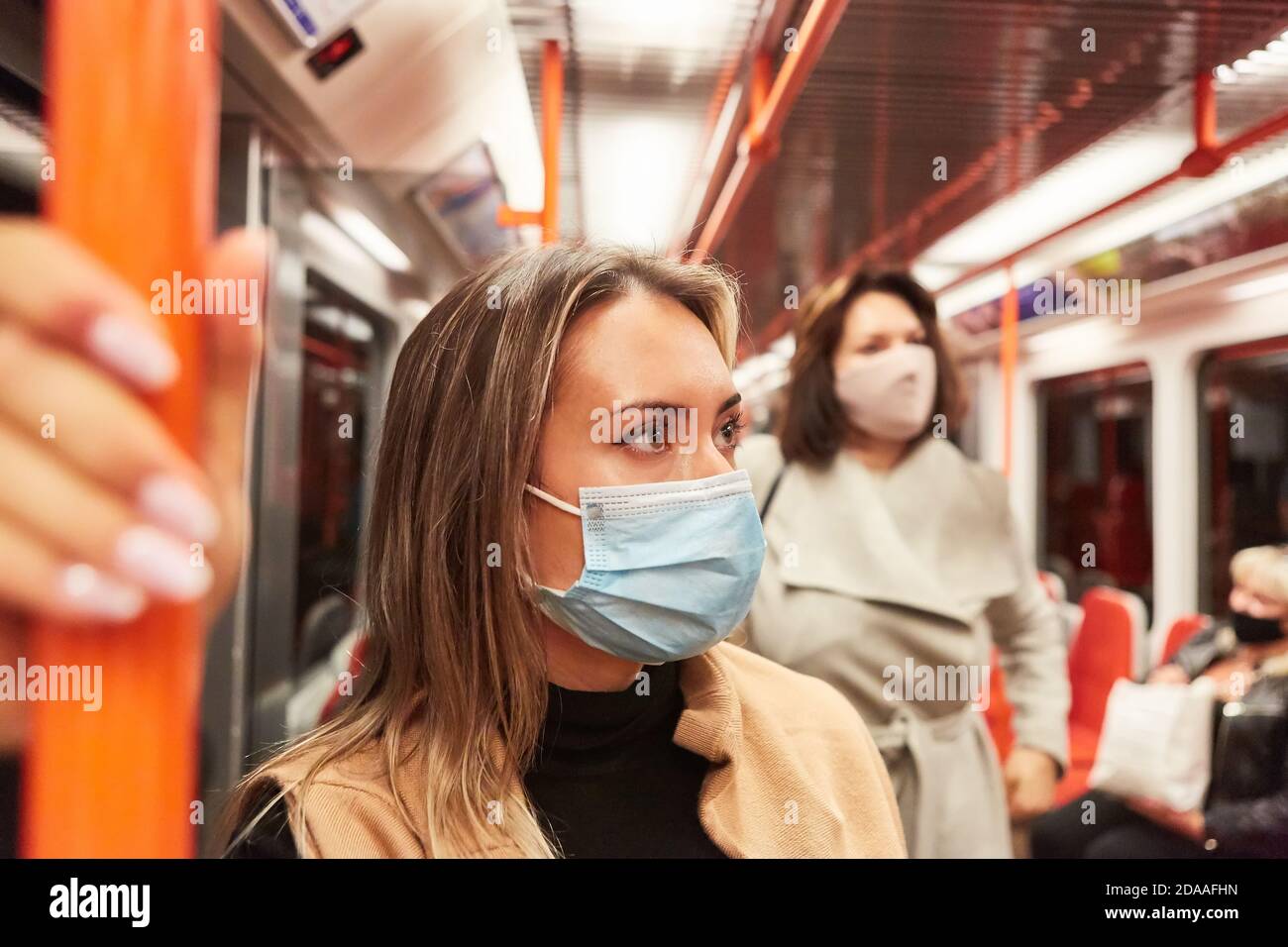 Mask requirement for passengers in local public transport due to Covid-19 pandemic Stock Photo