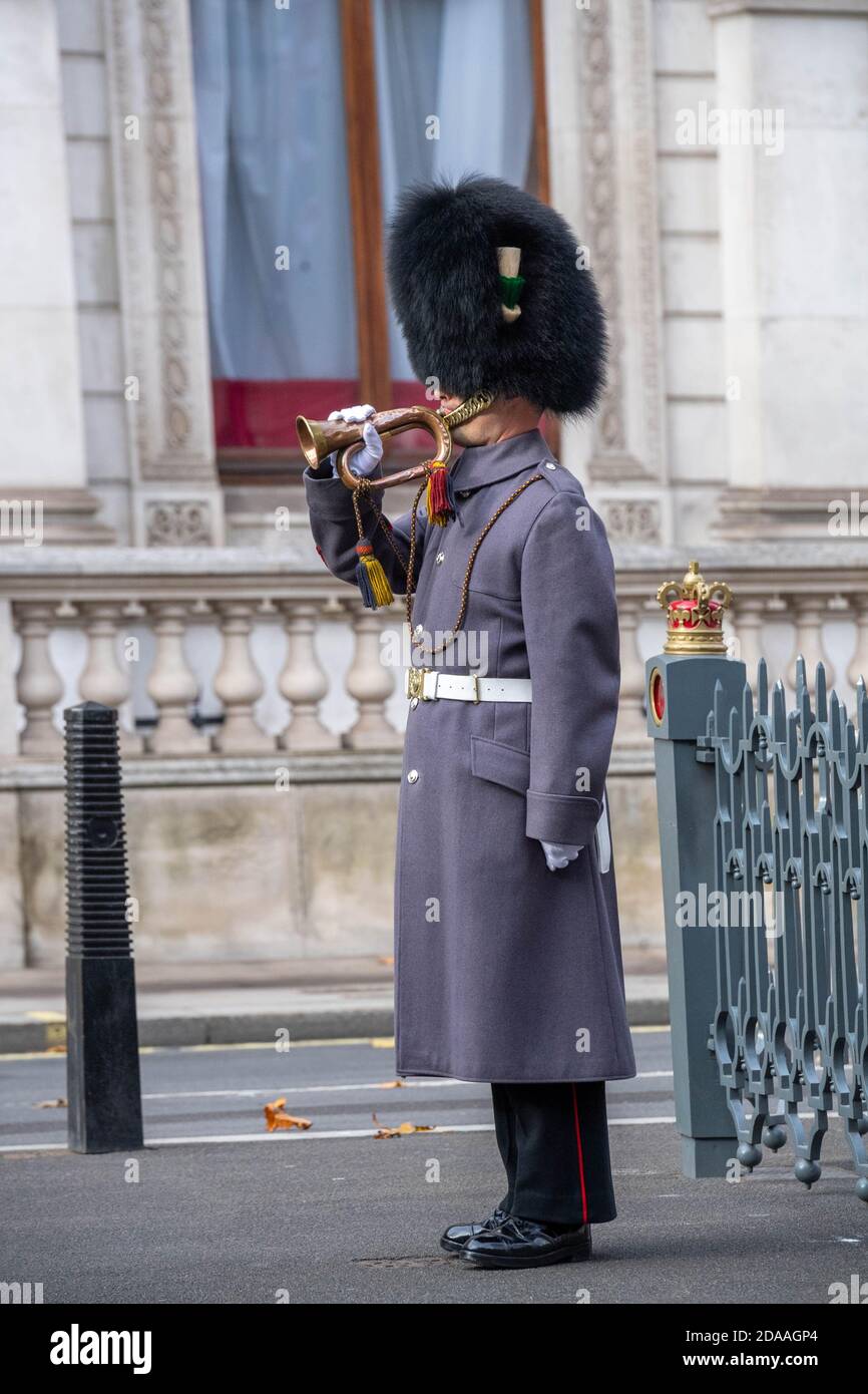 London, UK. 11th Nov, 2020. Two minute silence at the Cenotaph Whitehall London in an event organised by the Western Front Association amid heavy security. Last post is played on a 1915 bugle Credit: Ian Davidson/Alamy Live News Stock Photo