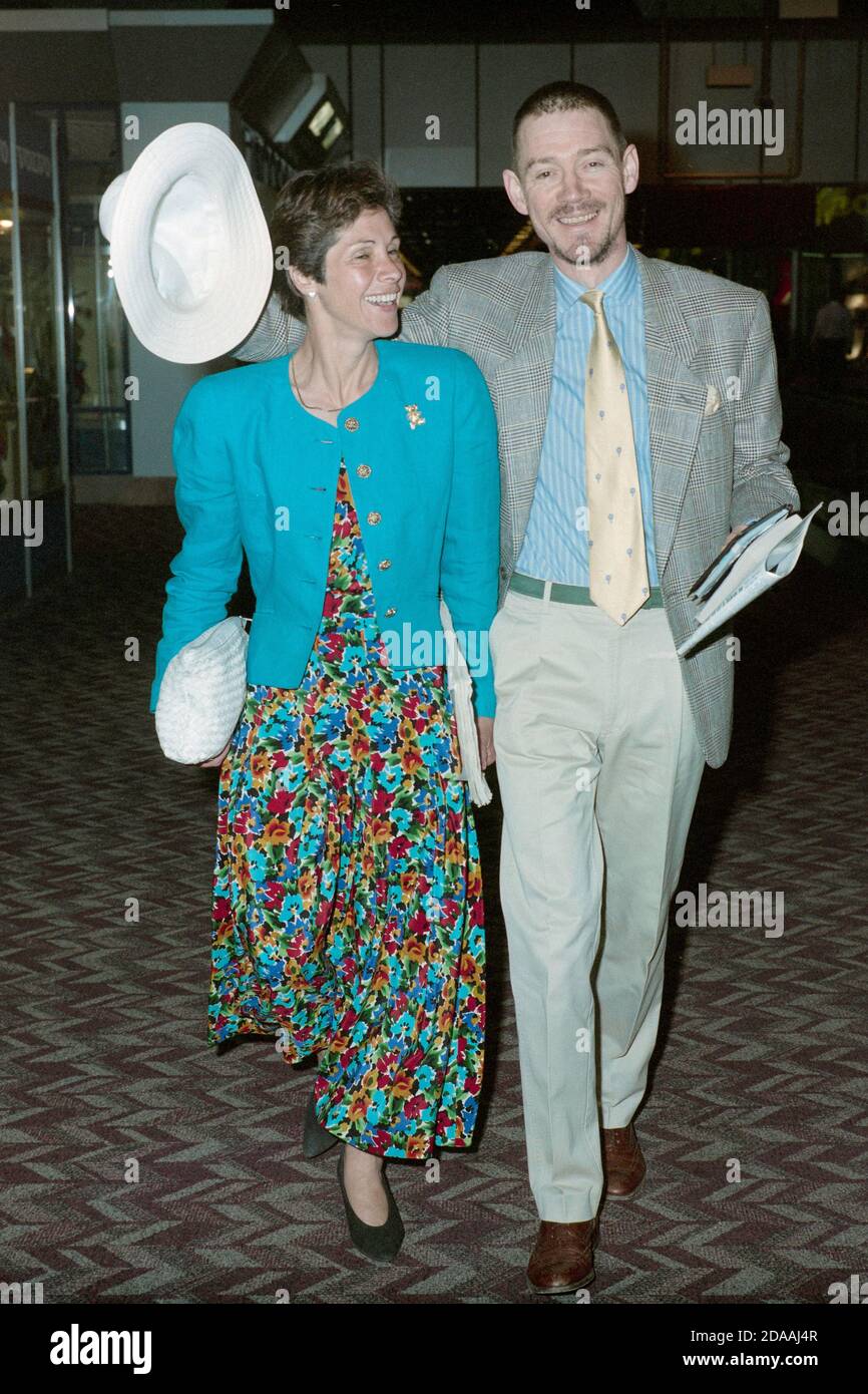 English Actor Anthony Andrews and wife Georgina Simpson at London Heathrow Airport June 1990 Stock Photo