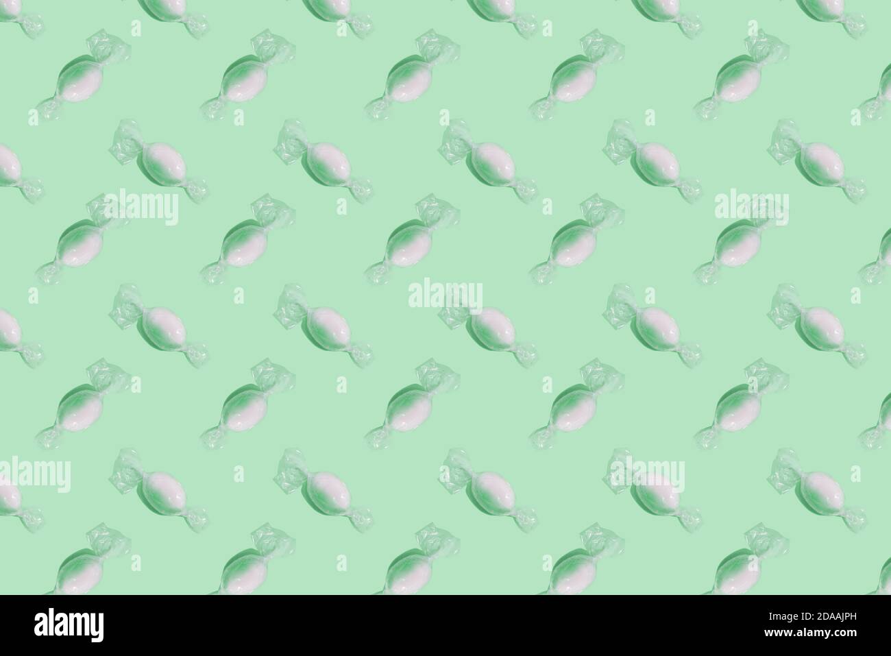 mint candy on pastel green background, isometric flat lay, seamless  pattern, green aesthetic fantasy Stock Photo - Alamy