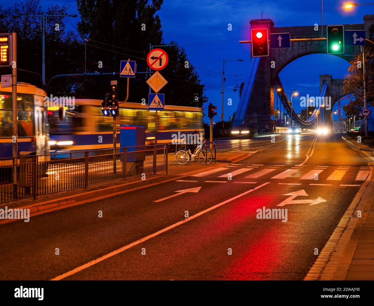 Night time traffic in a city. Urban life, Public transportation Stock Photo