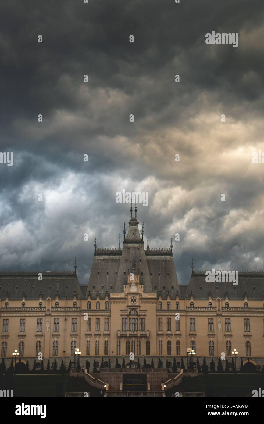 Palace of Culture, Castle, dramatic clouds as background, yellow light Stock Photo