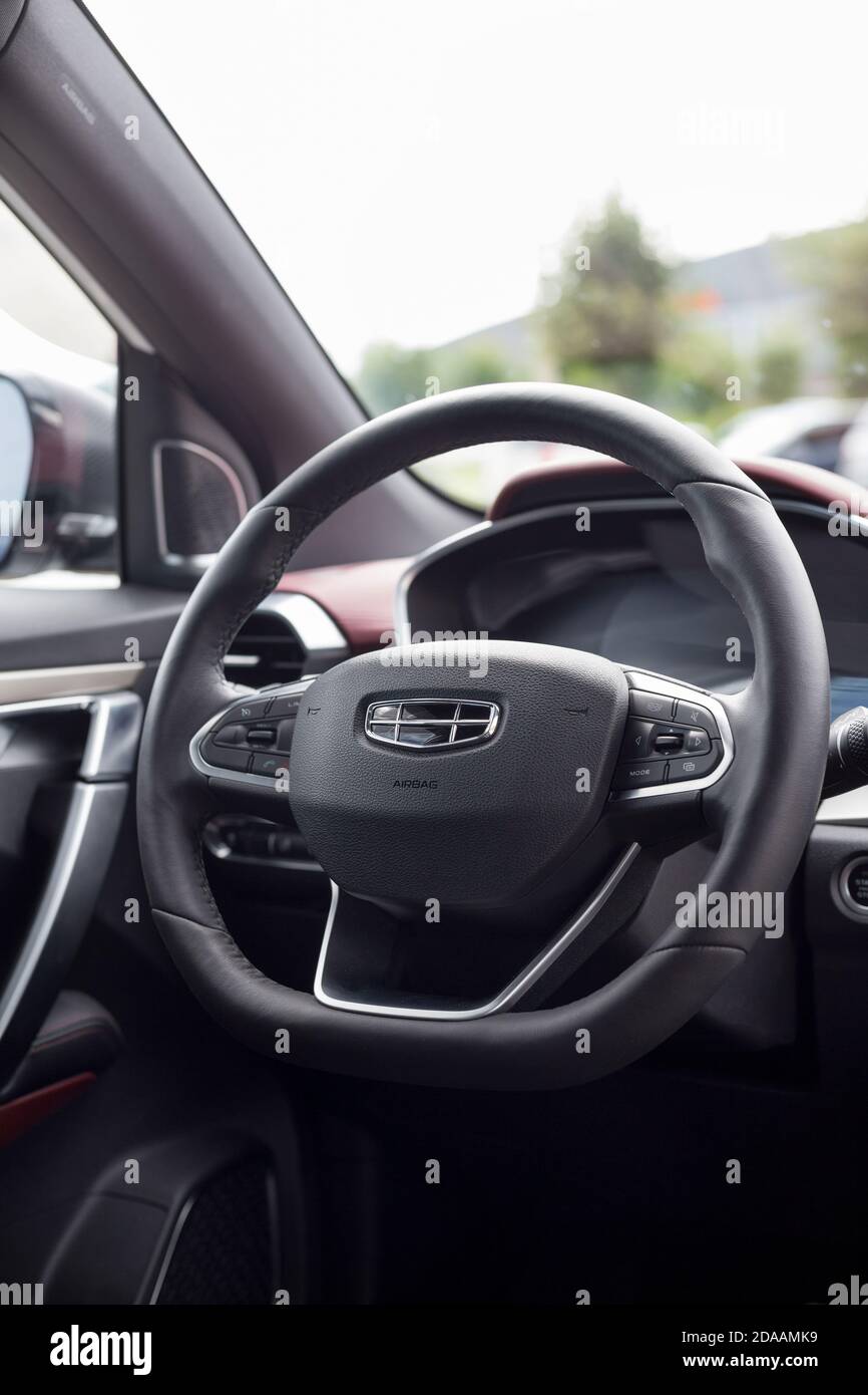Russia, Izhevsk - August 14, 2020: Geely showroom. Steering wheel of new CoolRay car with leather cover. Car manufacturer from China Stock Photo