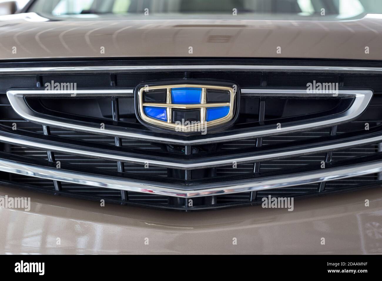 Russia, Izhevsk - August 14, 2020: Geely showroom. Logo of Geely brand on bumper of CoolRay car. Car manufacturer from China. Modern transportation. Stock Photo