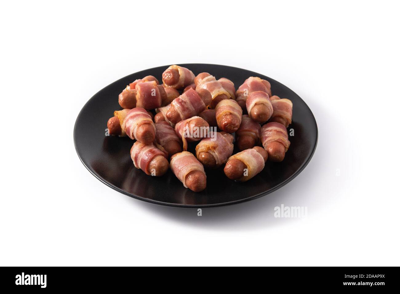 Pig in blankets. Sausages wrapped in smoked bacon isolated on white background Stock Photo Alamy