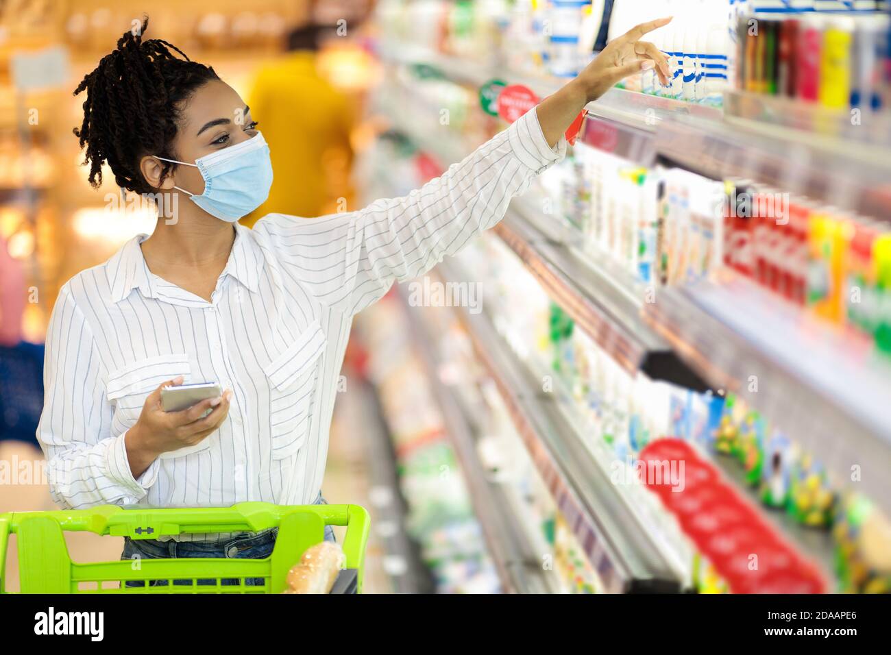 African woman wearing mask hi-res stock photography and images - Alamy