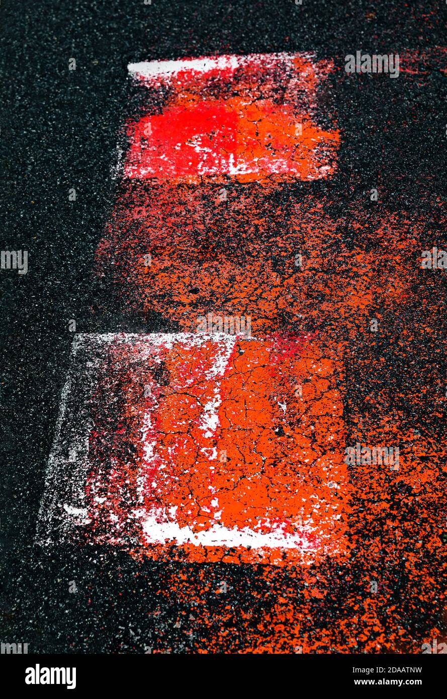 Abstract colorful composition on the asphalt. Abstract sign on asphalt ...