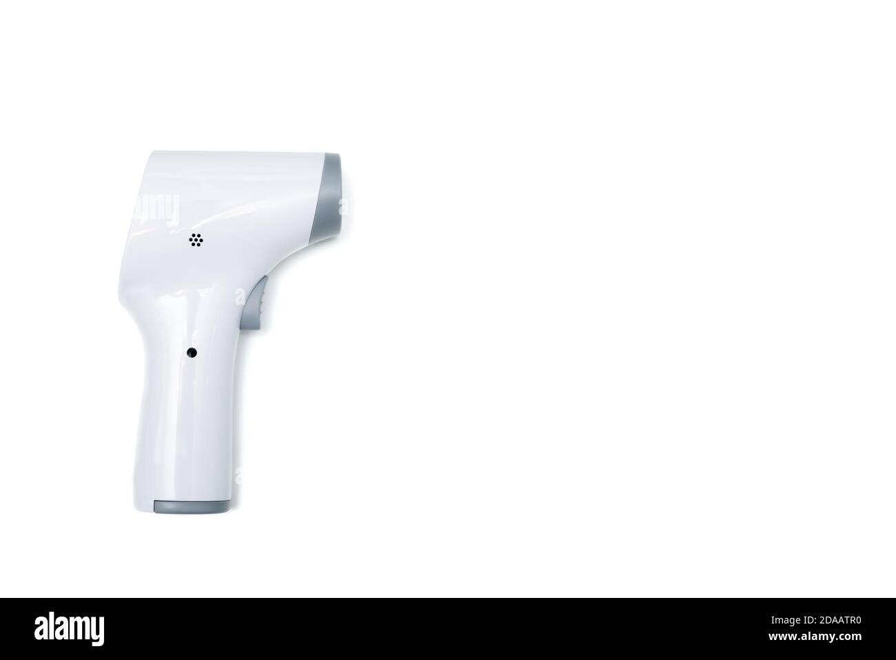 Temperature gun isolated on white background. Close up of laser thermometer with copy space for text. Stock Photo