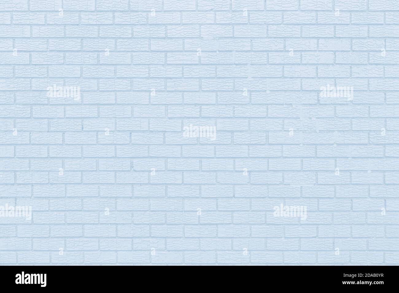 Brick wall texture background in light blue tonality Stock Photo - Alamy