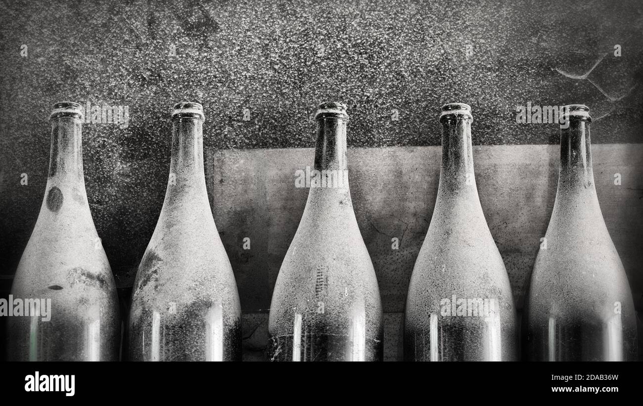 Old bottles of beer covered with dust Stock Photo Alamy