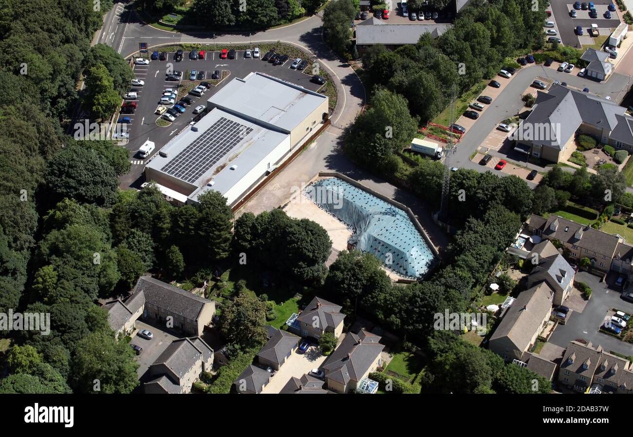 aerial view of the Aldi supermarket and former Council Highways Depot and hardstanding area on the Banbury Road in Chipping Norton, Oxfordshire Stock Photo