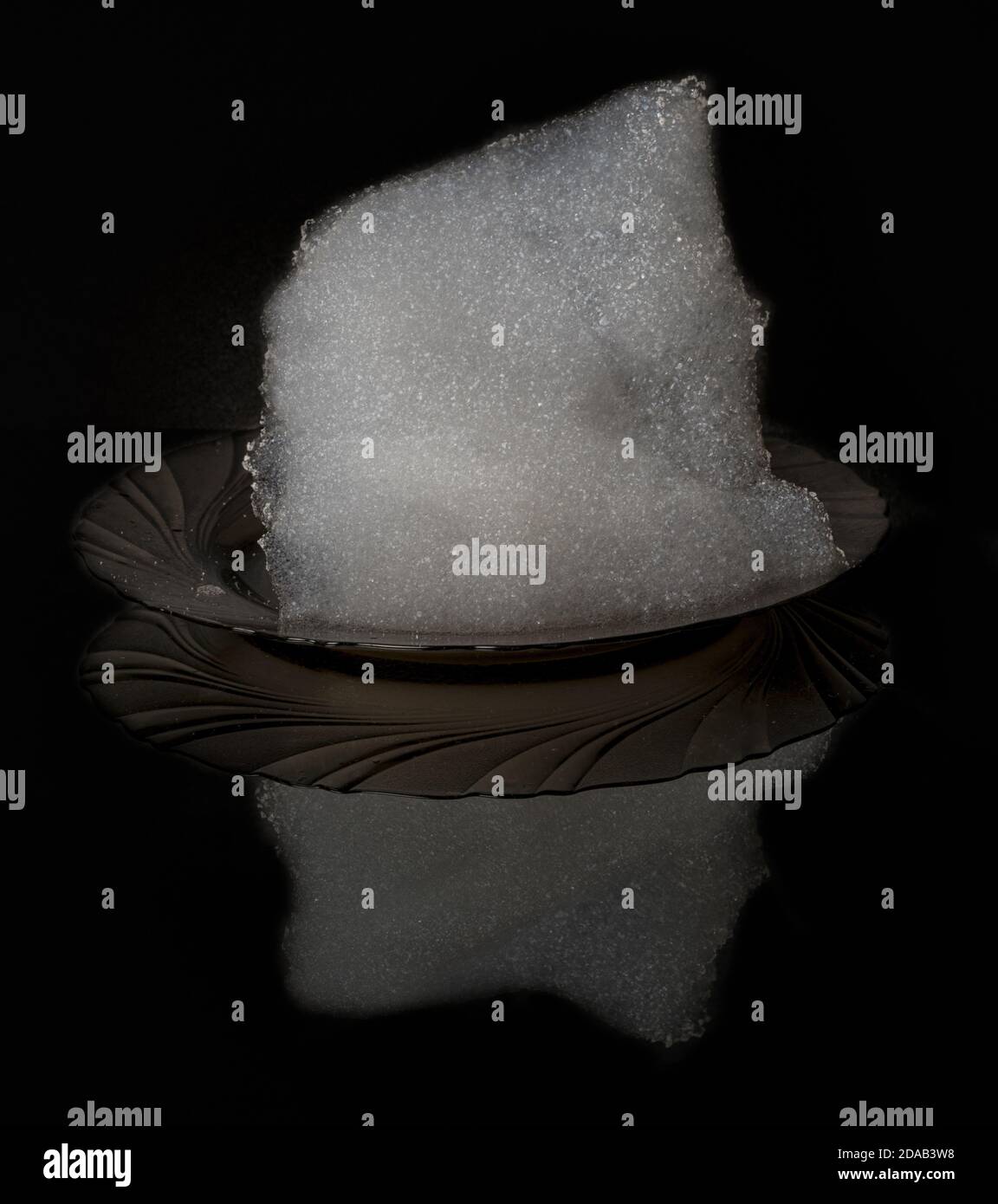 White dishwashing foam on the plate with reflection isolated on black background. Template for adding to your photos - just add it in lighten blending Stock Photo