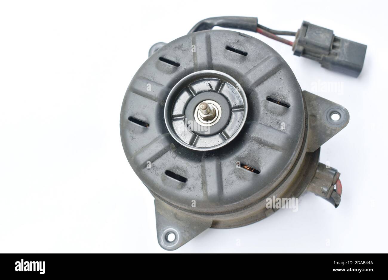 broken electric fan motor for car air conditioner system on white