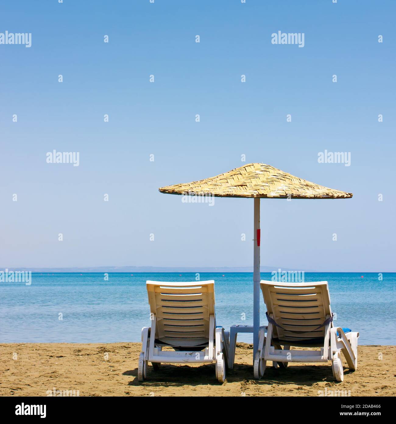 Two old beach chairs and umbrella Stock Photo Alamy
