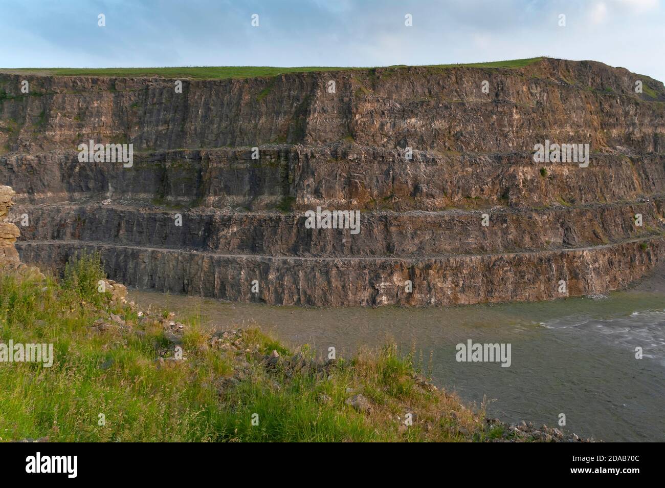 Castleton Quarry Steep benches of excavated limestone in the abandoned Eldon HIll Quarry ...