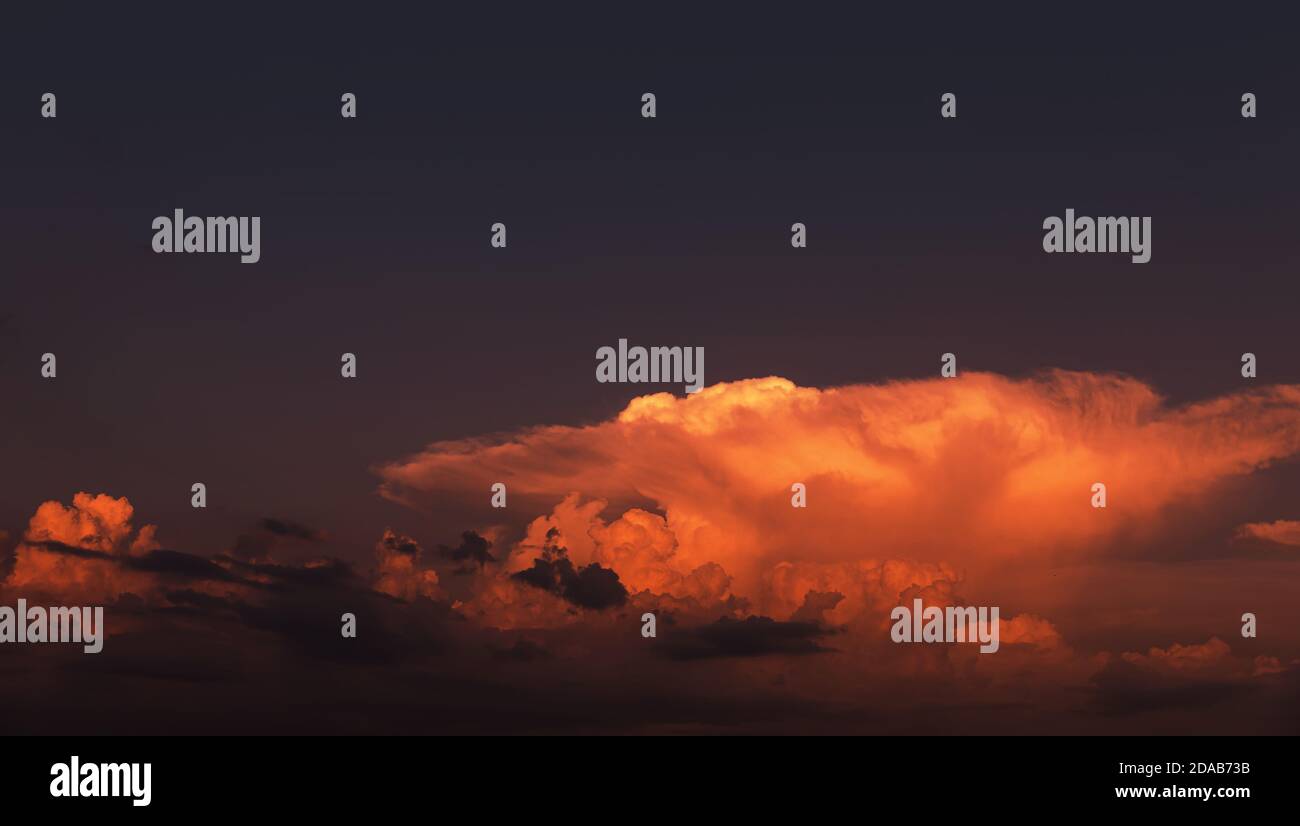 Sunset and clouds background. Sunset sky with fluffy clouds. Dramatic ...