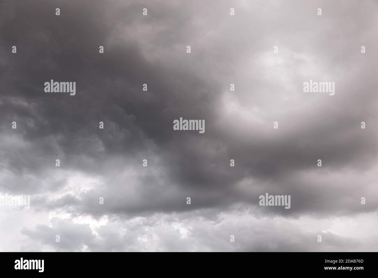 Nature background with stormy clouds. Dark dramatic sky with a stormy ...