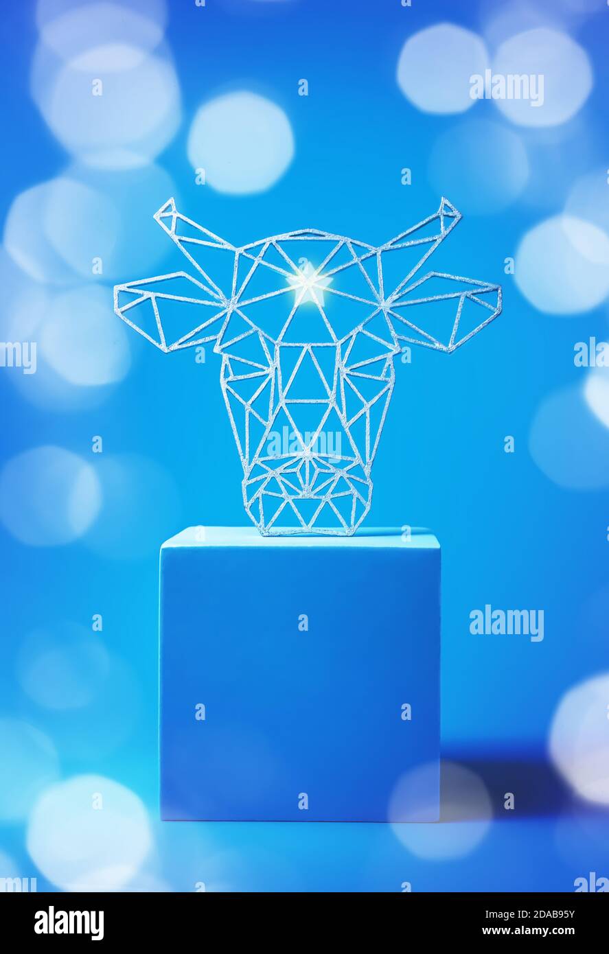 year of the white metal bull. curly bull's head on a blue background. Stock Photo