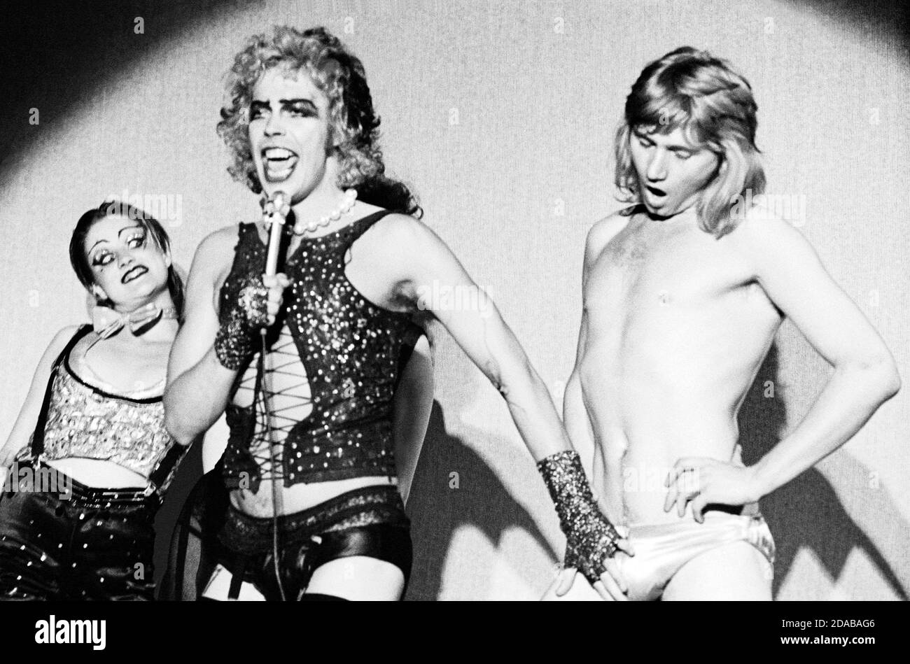 l-r: Little Nell (Columbia), Tim Curry (Frank-n-furter), Rayner Bourton (Rocky Horror) in THE ROCKY HORROR SHOW at the Chelsea Classic Cinema, London SW3 14/08/1973  transfer from the the Theatre Upstairs, Royal Court Theatre  book, music & lyrics by Richard O'Brien  set design: Brian Thomson  costumes: Sue Blane  lighting: Gerry Jenkinson  director: Jim Sharman Stock Photo
