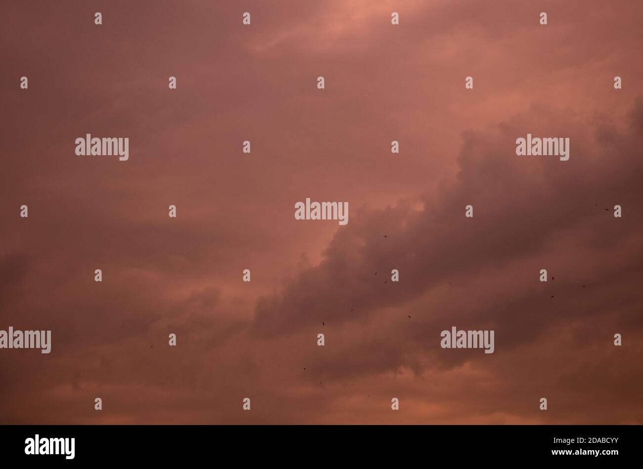 Storm day, dramatic clouds layout wallpaper, red sky Stock Photo