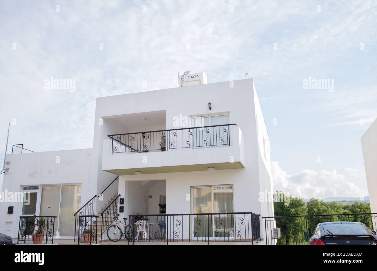 Living buildings, Cyprus Greek architecture, sunshine Stock Photo Alamy