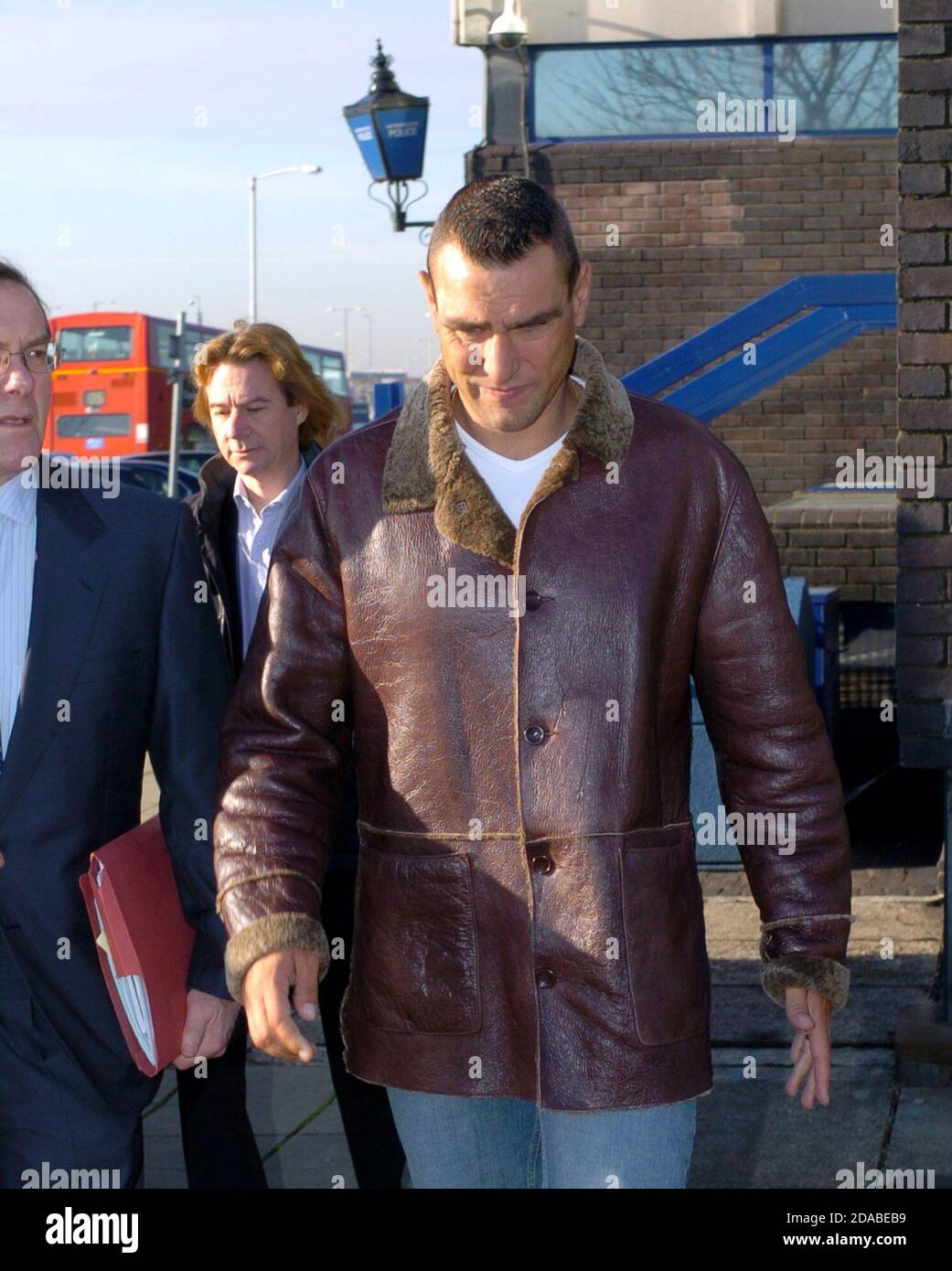 Actor and former footballer Vinnie Jones leaving Heathrow Police station in 2003 following an arrest for being drunk on an aircraft, using threatening abusive or insulting words, and common assault on a male passenger. Stock Photo